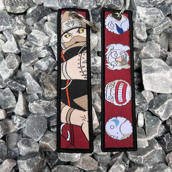 Porte-clé en tissu – Kakuzu et ses masques d’éléments